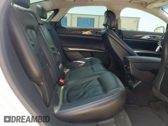 2016 Lincoln MKZ with VIN 3LN6L2GK3GR600599, listed as a Copart auction lot 60250585 with 90,192 mi miles and Salvage title. Bid and sale history available at DreamBid. Image 10.