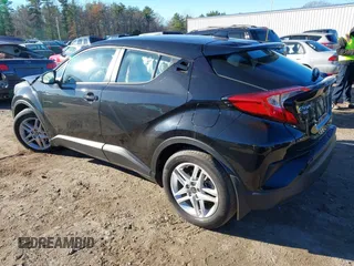 2021 Toyota C-HR LE with VIN NMTKHMBXXMR123633, listed as a IAAI auction lot 40787336 with 28,234 mi miles. Bid and sale history available at carsss.com. Image 3.