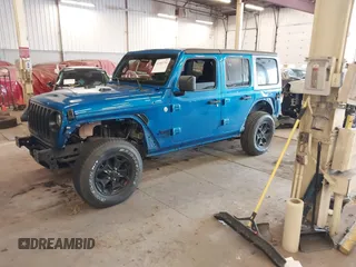 2021 Jeep Wrangler Unlimited Sport S with VIN 1C4HJXDG9MW797013, listed as a IAAI auction lot 41966754 with 53,583 mi miles. Bid and sale history available at carsss.com. Image 23.