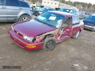 1997 Toyota Corolla with VIN 2T1BA02E9VC187458, listed as a IAAI auction lot 41441222 with 143,225 mi miles. Bid and sale history available at carsss.com. Image 2.