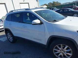 2015 Jeep Cherokee Limited with VIN 1C4PJMDS7FW688762, listed as a IAAI auction lot 41709877 with 154,499 mi miles. Bid and sale history available at carsss.com. Image 13.
