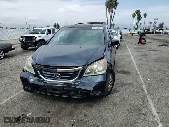 2010 Honda Odyssey EX with VIN 5FNRL3H46AB105054, listed as a Copart auction lot 56710665 with 118,156 mi miles and Salvage title. Bid and sale history available at DreamBid. Image 14.