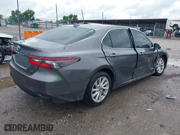 2024 Toyota Camry LE z VIN 4T1C11AK2RU879602, wystawiony jako IAAI lot #42162353 z przebiegiem 6 185 mil mil oraz . Historia ofert i sprzedaży dostępna na DreamBid. Obrazek 4.