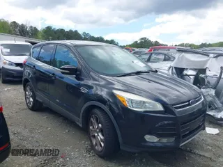 2013 Ford Escape SEL with VIN 1FMCU0H97DUC94687, listed as a IAAI auction lot 42024797 with 207,216 mi miles. Bid and sale history available at carsss.com. Image 1.