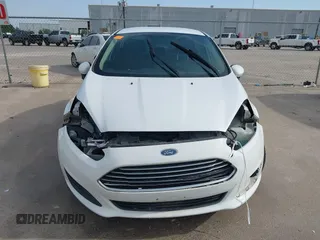 2017 Ford Fiesta SE z VIN 3FADP4BJ1HM126375, wystawiony jako IAAI lot #42244318 z przebiegiem 70 829 mil mil oraz . Historia ofert i sprzedaży dostępna na DreamBid. Obrazek 13.