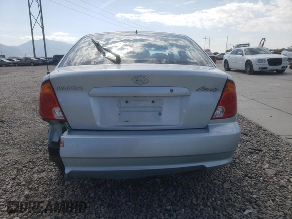 2005 Hyundai Accent GLS with VIN KMHCG35C55U341192, listed as a Copart auction lot 70708994 with 174,872 mi miles and Salvage Title. Bid and sale history available at carsss.com. Image 6.
