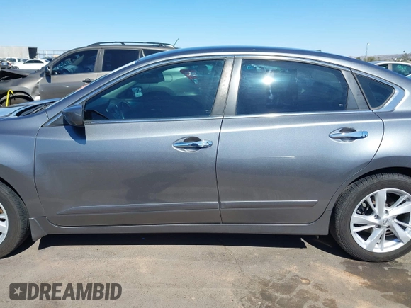 2015 Nissan Altima SV with VIN 1N4AL3AP5FC576818, listed as a IAAI auction lot 42129973 with 128,969 mi miles and . Bid and sale history available at carsss.com. Image 14.