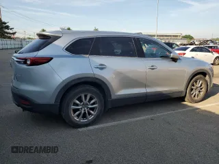 2018 Mazda CX-9 Touring z VIN JM3TCACY4J0219449, wystawiony jako Copart lot #61949725 z przebiegiem 134 904 mil mil oraz Czysty tytuł • Clean title. Historia ofert i sprzedaży dostępna na DreamBid. Obrazek 3.