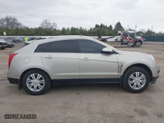 2016 Cadillac SRX Luxury Collection with VIN 3GYFNBE30GS523607, listed as a IAAI auction lot 41826457 with 94,117 mi miles. Bid and sale history available at carsss.com. Image 14.