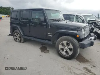 2017 Jeep Wrangler Unlimited Sahara with VIN 1C4BJWEG9HL633296, listed as a Copart auction lot 61387685 with 74,035 mi miles and Salvage title. Bid and sale history available at DreamBid. Image 4.