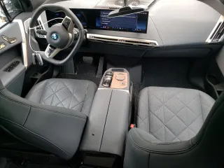 2024 BMW iX xDrive50 with VIN WB523CF09RCP70617, listed as a Copart auction lot 58091014 with 2,539 mi miles and Salvage Title. Bid and sale history available at carsss.com. Image 8.
