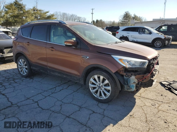 2017 Ford Escape Titanium with VIN 1FMCU9JDXHUA78843, listed as a Copart auction lot 42809485 with 93,562 mi miles and Salvage Title. Bid and sale history available at carsss.com. Image 4.