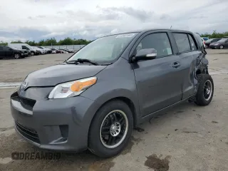 2008 Scion xD with VIN JTKKU10448J031272, listed as a Copart auction lot 51302185 with 121,055 mi miles and Salvage Title. Bid and sale history available at carsss.com. Image 1.