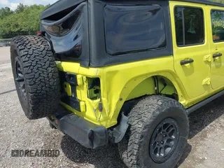 2023 Jeep Wrangler Sport with VIN 1C4HJXDG5PW693865, listed as a IAAI auction lot 40068881 with 12,149 mi miles and . Bid and sale history available at DreamBid. Image 6.