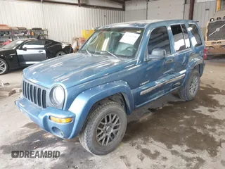 2004 Jeep Liberty Limited with VIN 1J4GK58K84W226666, listed as a IAAI auction lot 41764238 with 148,664 mi miles. Bid and sale history available at carsss.com. Image 20.