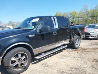 2005 Ford F-150 XLT with VIN 1FTRW12W65FB12867, listed as a IAAI auction lot 42143592 with 182,481 mi miles and . Bid and sale history available at DreamBid. Image 6.