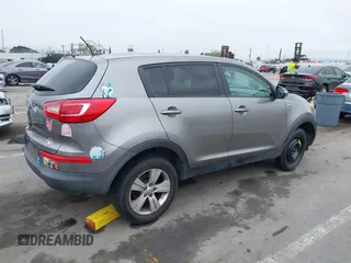 2013 Kia Sportage LX with VIN KNDPBCA23D7529658, listed as a IAAI auction lot 42473877 with 114,797 mi miles and . Bid and sale history available at DreamBid. Image 4.