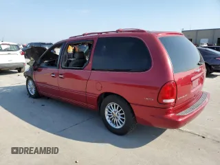 1999 Chrysler Town & Country LXi with VIN 1C4GP64L0XB536320, listed as a Copart auction lot 74194134 with Not Provided miles and Salvage Title. Bid and sale history available at carsss.com. Image 2.