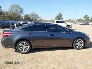 2014 Toyota Avalon Limited z VIN 4T1BK1EB9EU107787, wystawiony jako IAAI lot #41826625 z przebiegiem 78 718 mil mil oraz . Historia ofert i sprzedaży dostępna na DreamBid. Obrazek 14.