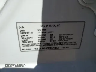 2024 Tesla Model Y Performance with VIN 7SAYGDEF6RA284171, listed as a Copart auction lot 50317205 with 6,870 mi miles and Salvage Title. Bid and sale history available at DreamBid. Image 14.