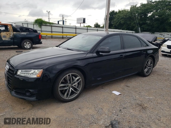 2017 Audi A8 with VIN WAU44AFD7HN010560, listed as a Copart auction lot 60020315 with 86,260 mi miles and Salvage title. Bid and sale history available at DreamBid. Image 1.