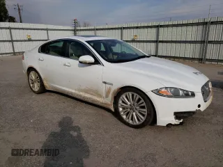 2012 Jaguar XF Portfolio with VIN SAJWA0HB4CLS36605, listed as a Copart auction lot 47179245 with 115,611 mi miles and Salvage Title. Bid and sale history available at carsss.com. Image 4.