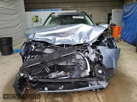 2023 Toyota Corolla Cross XLE with VIN 7MUEAABG4PV062131, listed as a Copart auction lot 56090105 with 43,409 mi miles and Salvage title. Bid and sale history available at DreamBid. Image 5.