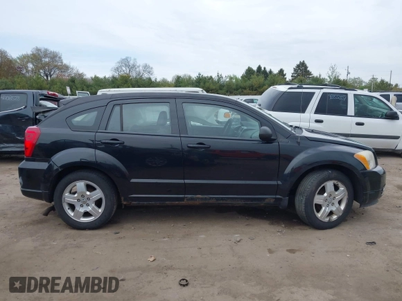 2009 Dodge Caliber SXT z VIN 1B3HB48A79D236542, wystawiony jako IAAI lot #42138476 z przebiegiem Nie podano mil oraz . Historia ofert i sprzedaży dostępna na DreamBid. Obrazek 13.