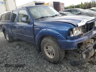 2010 Ford Ranger XLT with VIN 1FTKR4EE4APA36387, listed as a Copart auction lot 56661415 with 226,688 mi miles and Salvage title. Bid and sale history available at DreamBid. Image 4.
