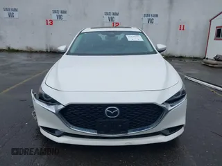 2020 Mazda 3 Premium with VIN 3MZBPBEMXLM133357, listed as a IAAI auction lot 41540234 with 81,280 mi miles and . Bid and sale history available at DreamBid. Image 13.