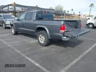 2003 Dodge Dakota SLT with VIN 1D7HL48N93S190381, listed as a IAAI auction lot 41921335 with 75,088 mi miles. Bid and sale history available at carsss.com. Image 3.