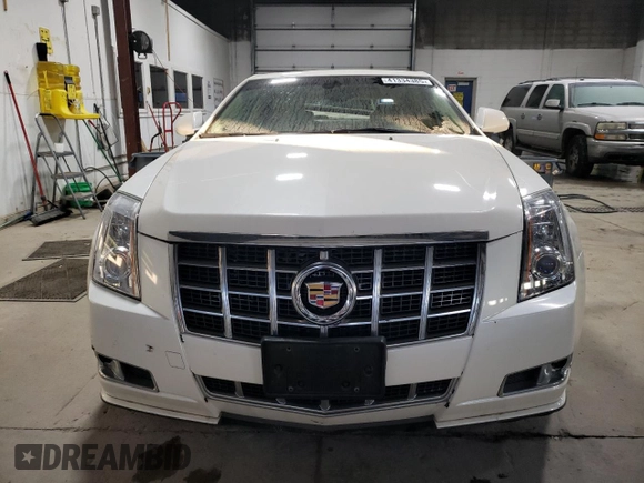 2013 Cadillac CTS Premium z VIN 1G6DS5E3XD0101681, wystawiony jako Copart lot #41334385 z przebiegiem 49 646 mil mil oraz Szkoda całkowita • Salvage title. Historia ofert i sprzedaży dostępna na DreamBid. Obrazek 5.