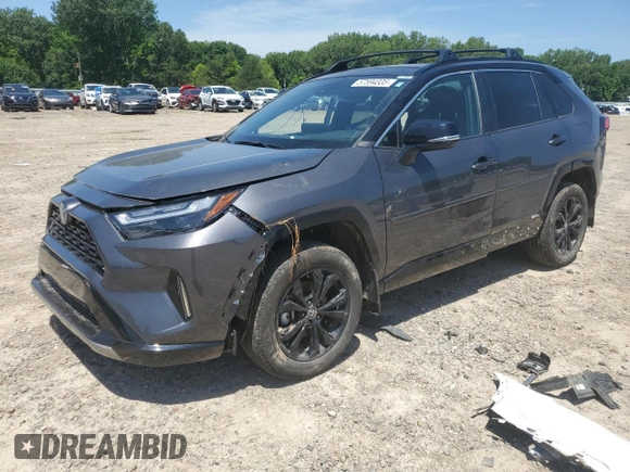 2023 Toyota RAV4 Hybrid XSE with VIN 2T3E6RFV9PW039963, listed as a Copart auction lot 57594335 with 27,486 mi miles and Salvage title. Bid and sale history available at DreamBid. Image 1.