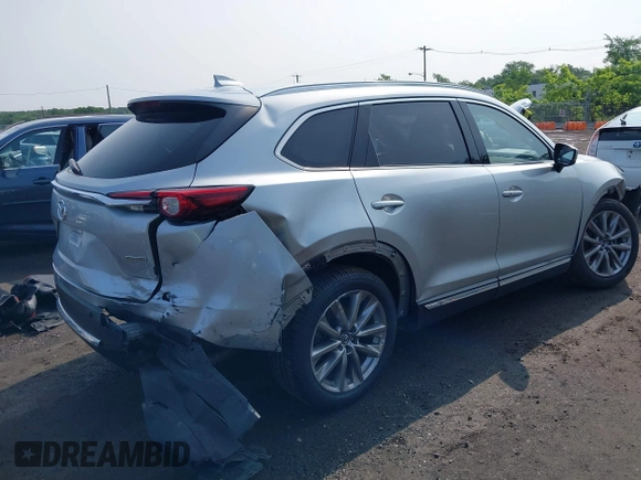 2020 Mazda CX-9 Grand Touring with VIN JM3TCBDY6L0424584, listed as a IAAI auction lot 42473920 with 32,385 mi miles and . Bid and sale history available at DreamBid. Image 4.