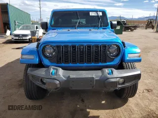 2024 Jeep Wrangler Sahara with VIN 1C4RJXP60RW163829, listed as a Copart auction lot 57182365 with 16,873 mi miles and Salvage title. Bid and sale history available at DreamBid. Image 5.