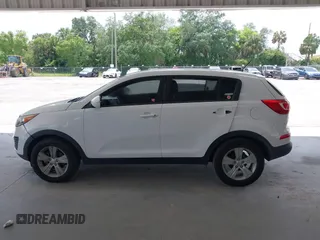 2013 Kia Sportage LX z VIN KNDPB3A2XD7521010, wystawiony jako IAAI lot #42297975 z przebiegiem 134 826 mil mil oraz . Historia ofert i sprzedaży dostępna na DreamBid. Obrazek 15.