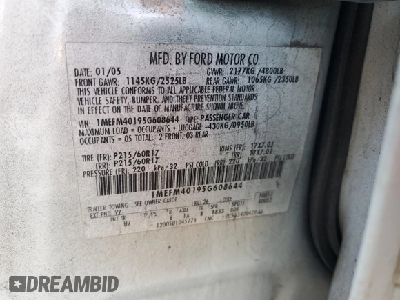 2005 Mercury Montego Luxury z VIN 1MEFM40195G608644, wystawiony jako Copart lot #83732794 z przebiegiem 231 619 mil mil oraz Szkoda całkowita • Salvage title. Historia ofert i sprzedaży dostępna na DreamBid. Obrazek 14.