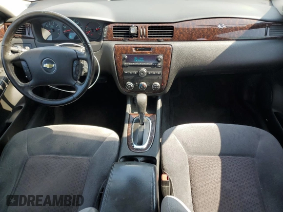2012 Chevrolet Impala LS Fleet with VIN 2G1WF5E34C1126565, listed as a Copart auction lot 60233495 with 154,528 mi miles and Salvage title. Bid and sale history available at DreamBid. Image 8.