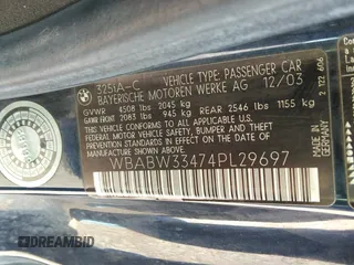 2004 BMW 3 Series 325Ci with VIN WBABW33474PL29697, listed as a IAAI auction lot 41718697 with 151,815 mi miles. Bid and sale history available at carsss.com. Image 9.