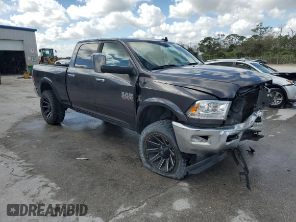 2014 Ram 2500 Laramie with VIN 3C6UR5FL0EG148066, listed as a Copart auction lot 42795415 with 202,415 mi miles and Salvage Title. Bid and sale history available at carsss.com. Image 4.