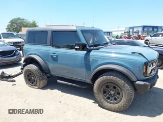 2021 Ford Bronco z VIN 1FMDE5CP5MLA98340, wystawiony jako IAAI lot #42064998 z przebiegiem 38 569 mil mil oraz . Historia ofert i sprzedaży dostępna na DreamBid. Obrazek 14.