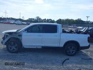 2022 Honda Ridgeline RTL with VIN 5FPYK3F51NB025152, listed as a IAAI auction lot 42325957 with 54,632 mi miles and . Bid and sale history available at DreamBid. Image 14.