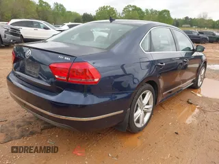 2014 Volkswagen Passat TDI SEL Premium with VIN 1VWCN7A36EC054891, listed as a IAAI auction lot 41964556 with 120,658 mi miles. Bid and sale history available at carsss.com. Image 4.