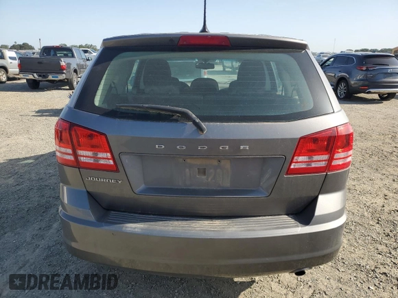 2013 Dodge Journey American Value with VIN 3C4PDCAB8DT590509, listed as a Copart auction lot 57347375 with 203,642 mi miles and Clean title. Bid and sale history available at DreamBid. Image 6.
