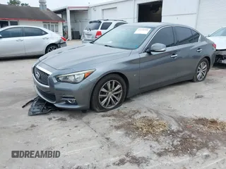 2015 Infiniti Q50 with VIN JN1BV7AP7FM357534, listed as a IAAI auction lot 41440900 with 101,982 mi miles. Bid and sale history available at carsss.com. Image 17.