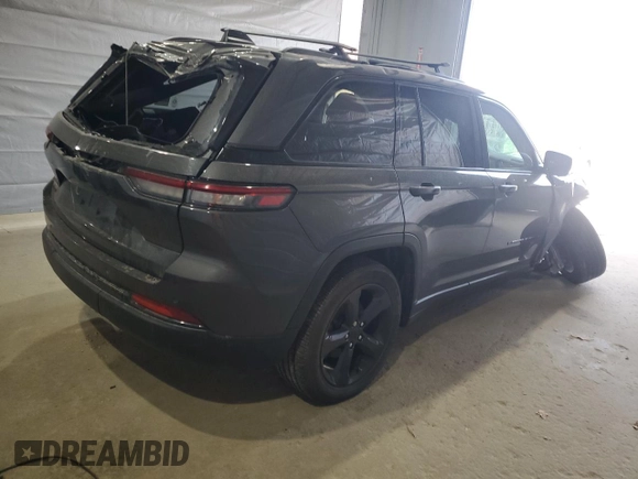 2023 Jeep Grand Cherokee Altitude with VIN 1C4RJHAGXP8701574, listed as a Copart auction lot 53596745 with 26,740 mi miles and Salvage title. Bid and sale history available at DreamBid. Image 3.