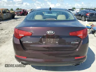 2013 Kia Optima EX z VIN 5XXGN4A70DG186128, wystawiony jako Copart lot #65836315 z przebiegiem 124 488 mil mil oraz Czysty tytuł • Clean title. Historia ofert i sprzedaży dostępna na DreamBid. Obrazek 6.