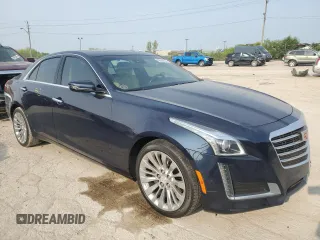 2017 Cadillac CTS Luxury AWD with VIN 1G6AX5SX7H0141380, listed as a Copart auction lot 58999135 with 91,003 mi miles and Salvage title. Bid and sale history available at DreamBid. Image 4.