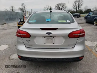 2017 Ford Focus SE with VIN 1FADP3F21HL267350, listed as a Copart auction lot 52897605 with 156,345 mi miles and Salvage title. Bid and sale history available at DreamBid. Image 6.