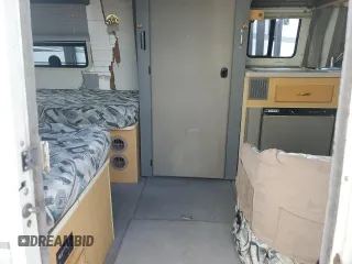 1997 Volkswagen EuroVan с VIN WV3AH8709VH082723, выставлен на аукционе Copart как лот 74735664 с пробегом 122 885 миль миль и Чистый • Clean title. История ставок и продаж доступна на DreamBid. Изображение 6.